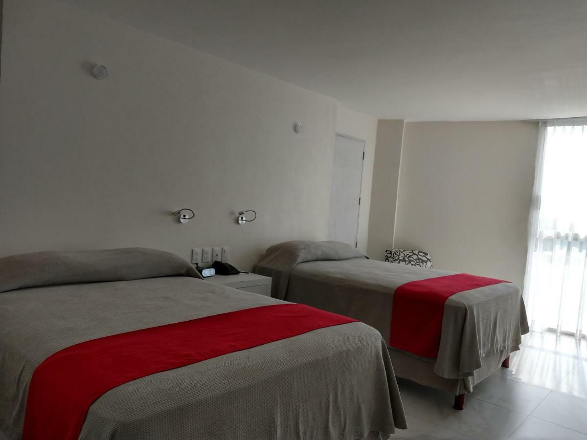 Habitación Doble con 2 camas dobles